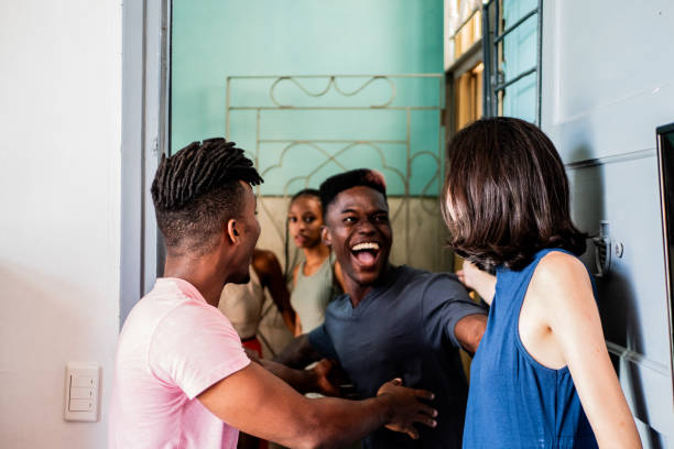 istock Young friends talking at home 2189049404