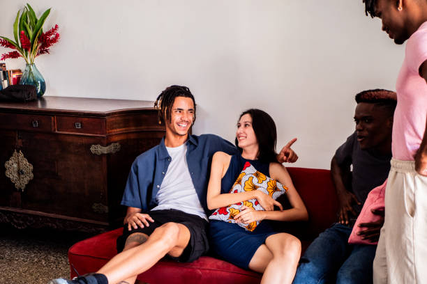 istock Young friends talking at home 2189049845