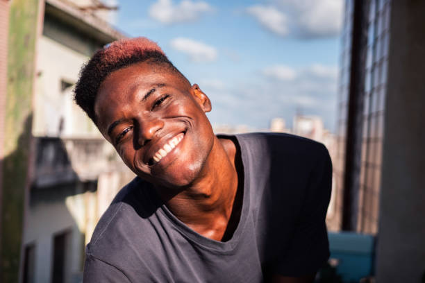 istock Portrait of young man at balcony 2189050012