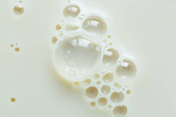 istock Close-up macro milk texture,White milk or soy bubble foam background on top view close up, 2189050296