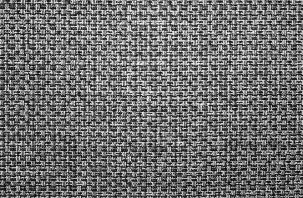 This intricate carbon fiber pattern features a series of interlocking shapes in varying shades of gray, creating a visually captivating tessellated design. The three-dimensional appearance of the pattern gives the illusion of cubes or blocks protruding from the surface, adding depth and texture. Ideal for enhancing the futuristic and high-tech aesthetics of websites, spacecraft interiors, automotive accessories, and modern design projects