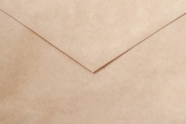 istock Beige paper envelope closeup with clean and minimalistic design 2189054521