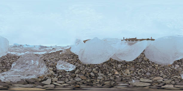Ice pebbles on shore of lake Vättern in Sweden