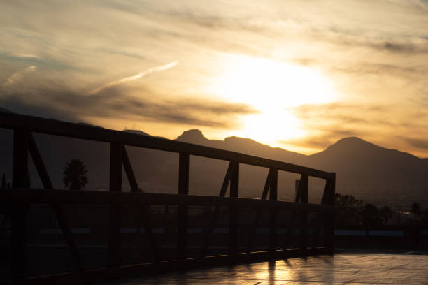 Sunset over a bridge in the Las Vegas Valley by the foothills