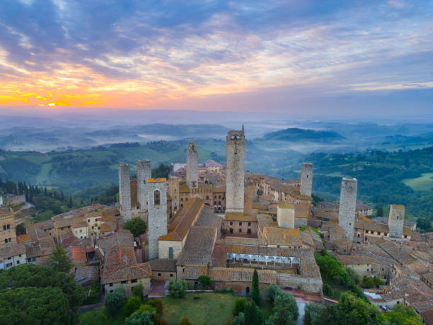 istock San Gimignano at dusk, medieval Tuscan town from drone 2189059794