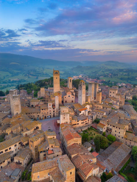 istock San Gimignano at dusk, medieval Tuscan town from drone 2189059799