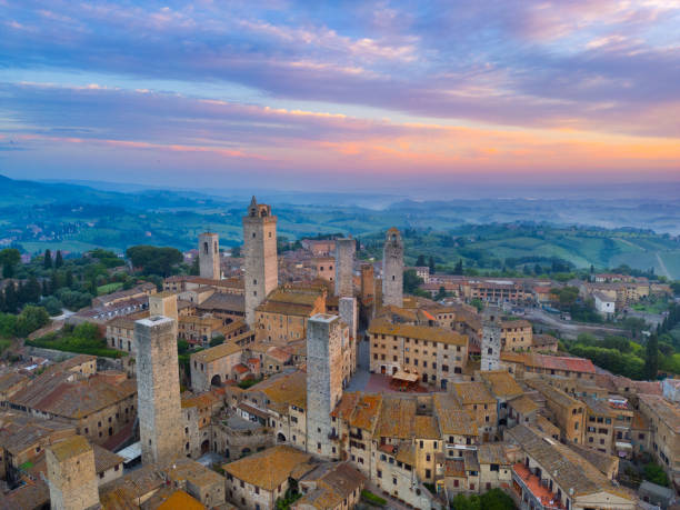 istock San Gimignano at dusk, medieval Tuscan town from drone 2189059801