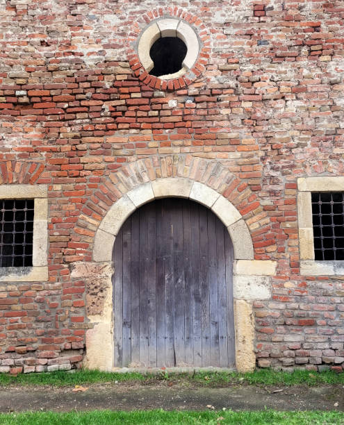 istock Old wall with door and windows 2189063816