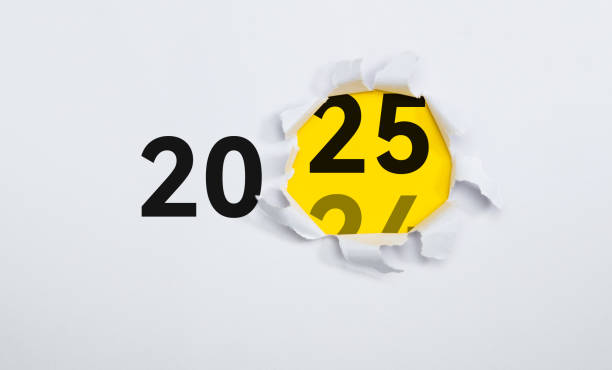 istock Changing of year from text 2024 to 2025 inside of yellow punch paper 2189067708
