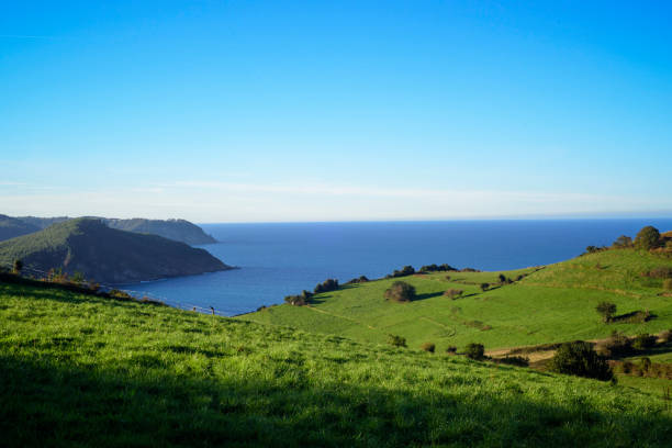 istock Bay in Asturias seashore from green grass meadows 2189067710