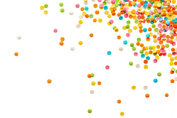 istock Sprinkle background. Colorful round sprinklers. Decoration for cake, donut, bakery. Candy topping background isolated on white background 2189068094
