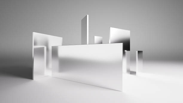 istock 3D visualization of polished chrome geometric shapes with mirror-like surfaces, randomly arranged vertically in a white room. The plates reflect each other, casting shadows under the studio lights 2189068323
