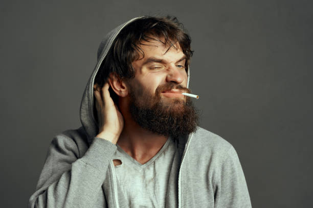 homeless bearded man holding sign help lifestyle financial problems. High quality photo
