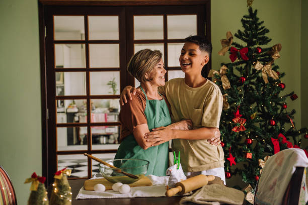 istock Grandmother preparing cake with her grandson 2189068429