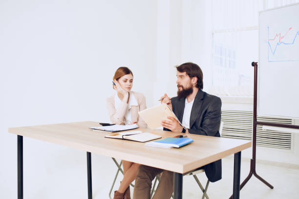 emotional man and woman at work colleagues at work communication. High quality photo