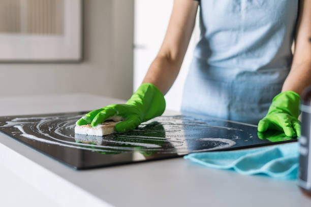 istock Efficient cleaning of a modern induction stove in a stylish kitchen 2189069600
