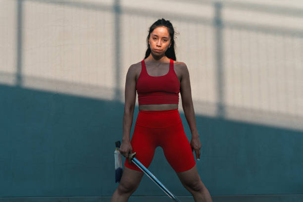 istock Chinese young woman practicing wushu kung fu. 2189073882
