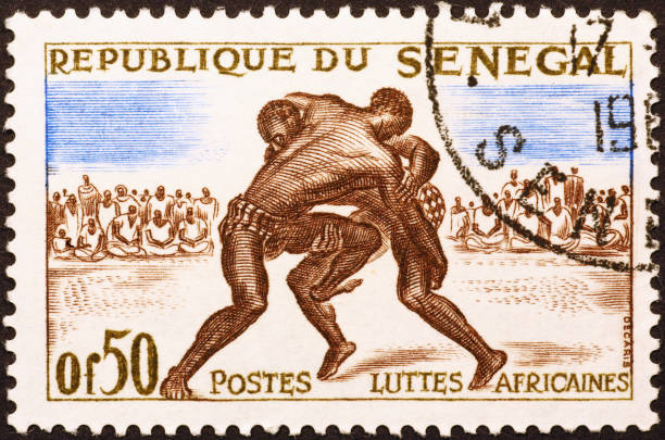 istock African wrestlers on old postage stamp of Senegal 2189073924