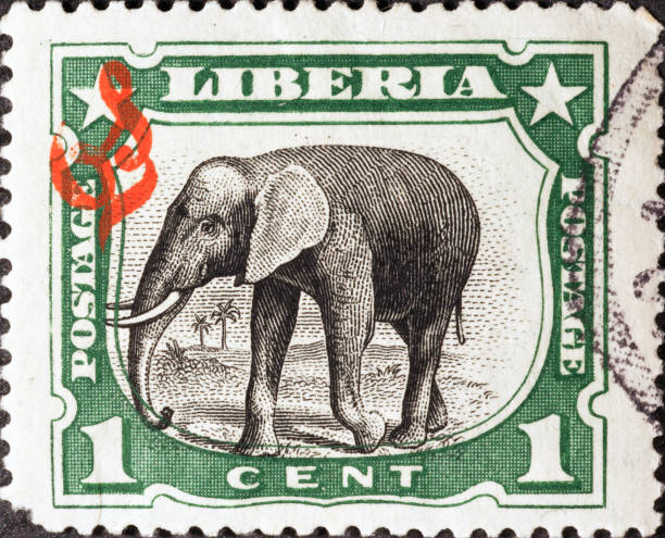 istock African elephant on vintage postage stamp of Liberia 2189073944