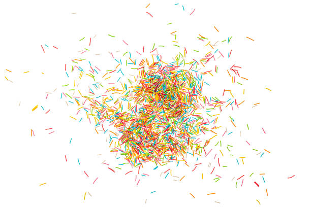 istock Sprinkle background. Colorful sprinklers. Decoration for cake, donut, bakery. Candy topping background isolated on white background 2189074055