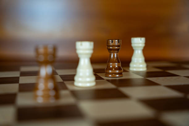 close up of king chess piece on blue background