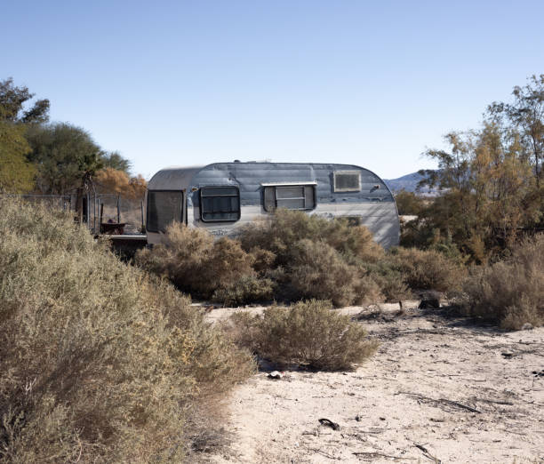 istock Vintage Trailer in Dusty Desert Landscape 2189077887