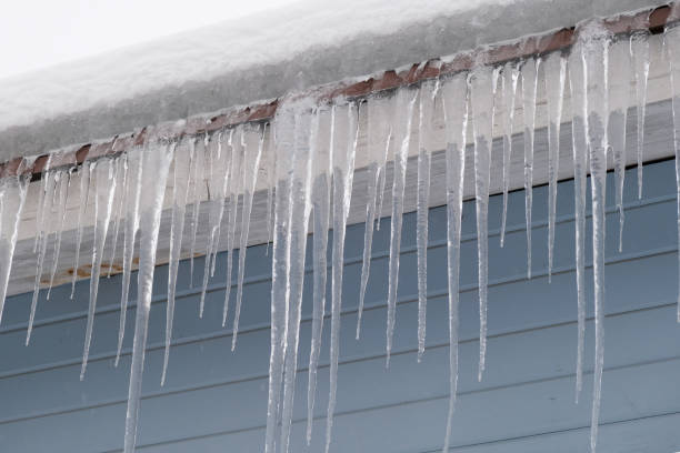 istock Beautiful icicles cascading from a roof and providing a view 2189078318