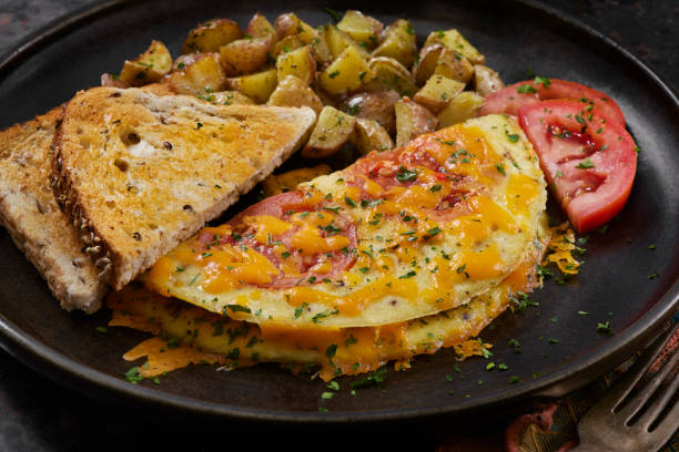The Viral Tomato Omelette with Cheddar Cheese, Toast and Hash Browns