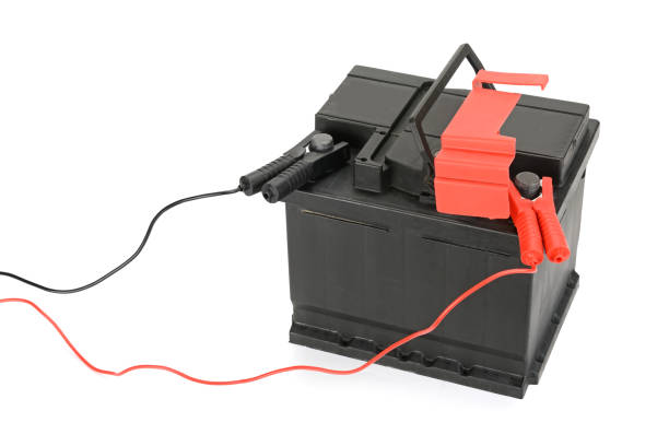 istock car battery and charger isolated on a white 2189081836