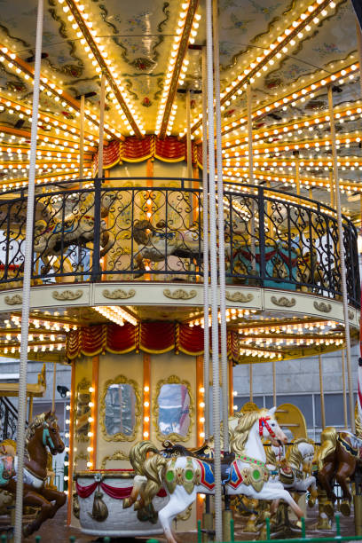 istock New Year's children's attraction carousel with horses 2189086391