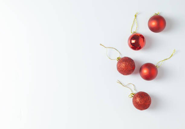 istock red Christmas balls on a white background 2189086770