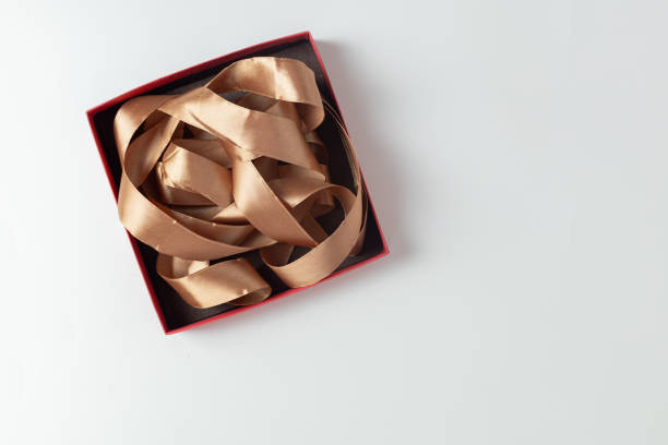 beige cloth and ribbon design / background material