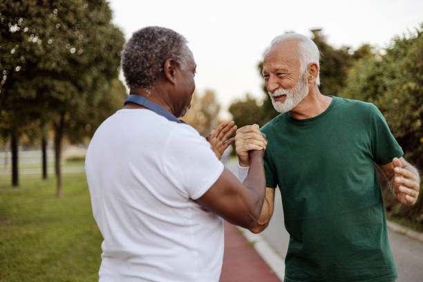 istock Two Elderly Friends Building Strength Through Outdoor Exercise 2189086881
