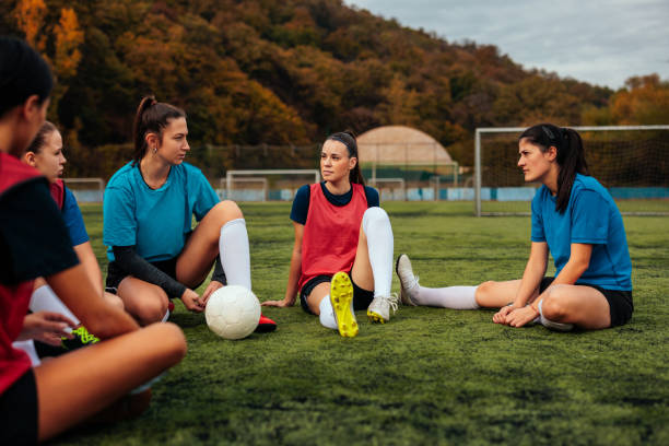 istock Female soccer players bonding on field. 2189087073