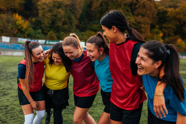 istock Happy soccer girls bonding in practice. 2189087096