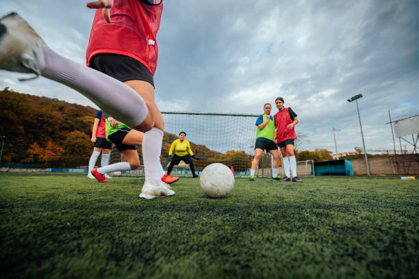 istock Female soccer player shooting on goal. 2189087115