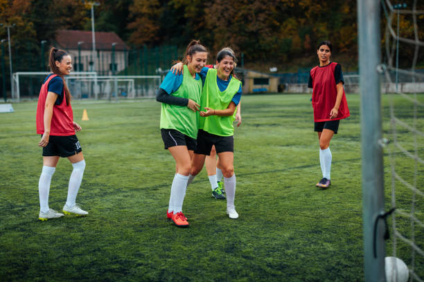 istock Cheerful female soccer players bonding in practice. 2189087120