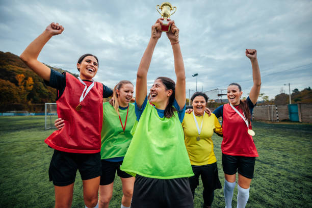 istock Female soccer players celebrating win. 2189087132