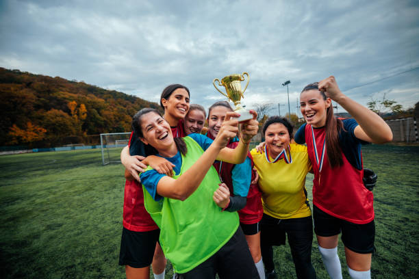 istock Cheerful soccer girls celebrating win. 2189087155