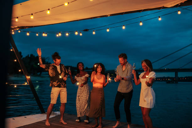 istock Summer night party on boat 2189089660