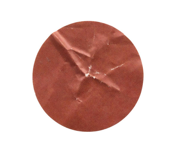 istock Blank brown round adhesive paper sticker label isolated on white background 2189097649