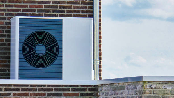 istock air source heat pump unit installed outdoors at a modern home with solar panels in the Netherlands 2189100770