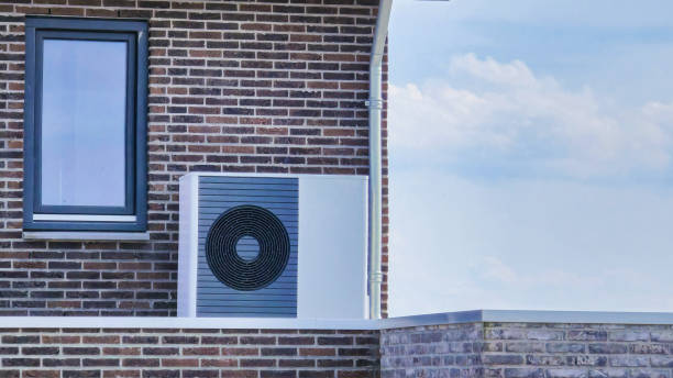 istock air source heat pump unit installed outdoors at a modern home with solar panels in the Netherlands 2189101740