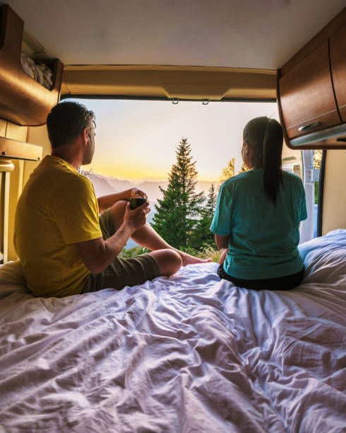 istock Enjoying a serene sunrise view from a cozy camper in Hallstatt, 2189107298
