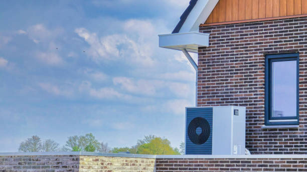istock air source heat pump unit installed outdoors at a modern home with solar panels in the Netherlands 2189109974