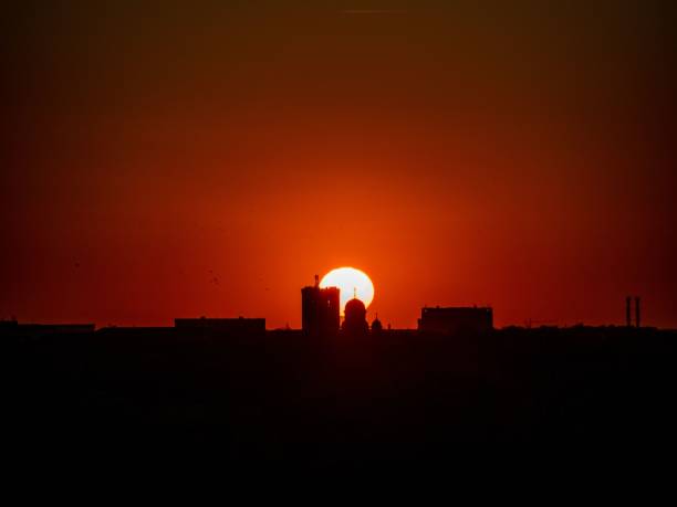 istock City skyline silhouetted by sunset 2189114935