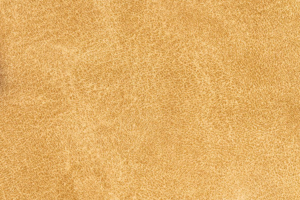 istock Yellow color abstract textile pattern background. Latte colour fabric material, colored background 2189124135