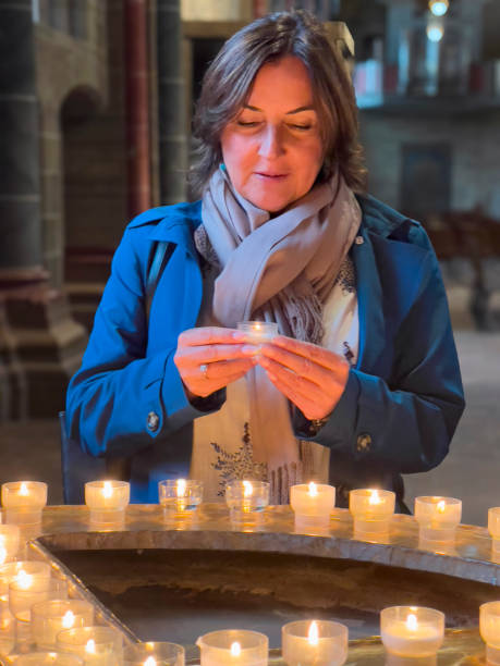 istock Woman praying for Christmas. 2189124478