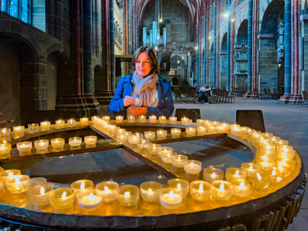 istock Woman praying for Christmas. 2189124495