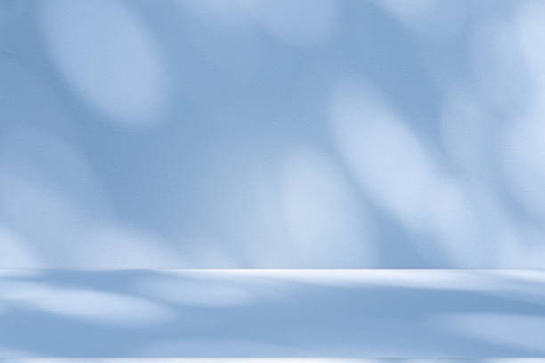 istock Studio style background wall decoration presentation uses white and blue tones. with shadows cast from a nearby window, concept creating a decorative 2189125442